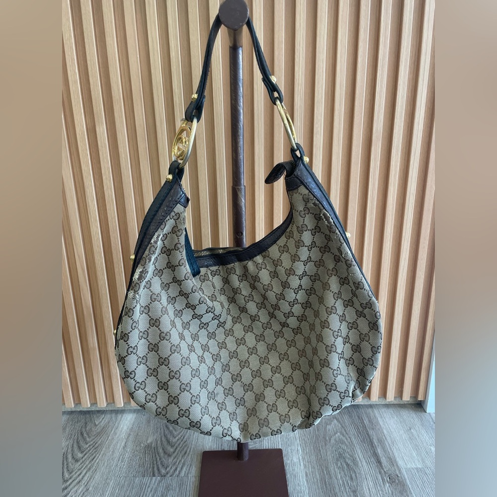 Authentic Gucci canvas pre loved hobo bag.